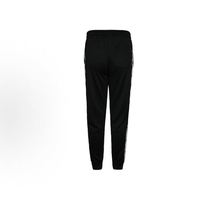 Black track pants with tapered fit and white side stripe on leg