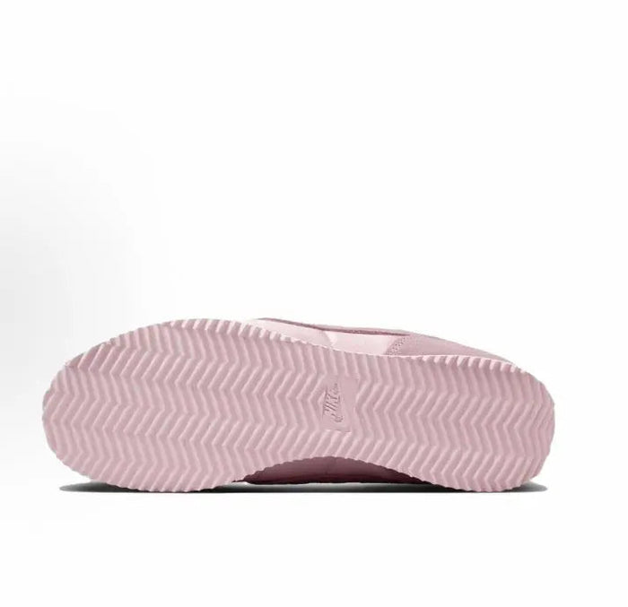 Pink Nike Cortez outsole with zigzag traction pattern