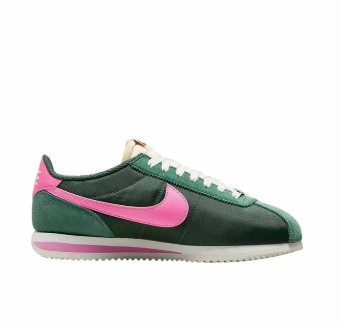 Nike Cortez low-top sneakers with pink swoosh, green upper, and white midsole