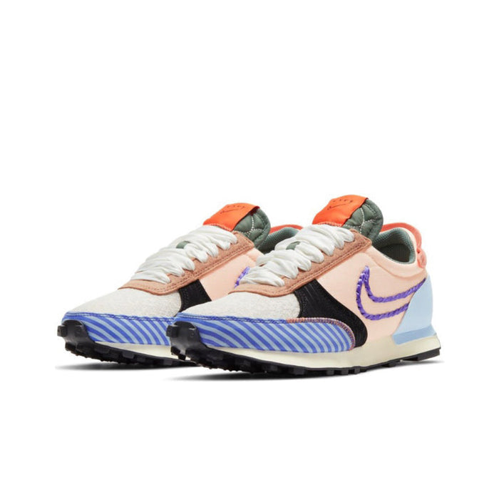 Nike Day Break sneaker pair front three-quarter view with blue striped sides and orange accents