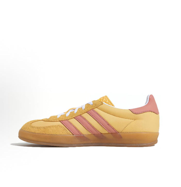 Gazelle Indoor sneakers in yellow suede with pink three-stripe design and white laces