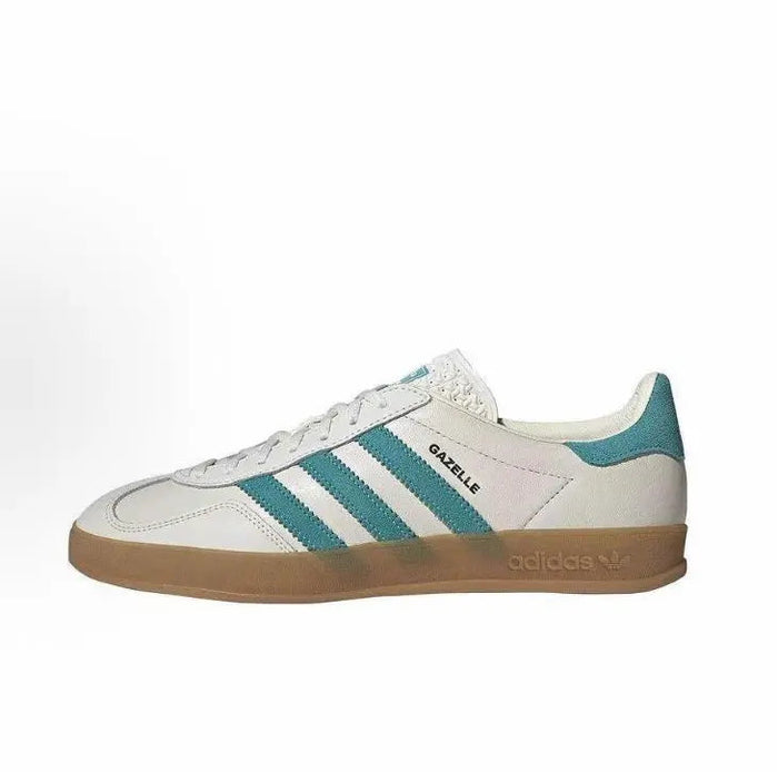 Adidas Gazelle low-top sneakers in white leather with teal stripes and gum rubber sole