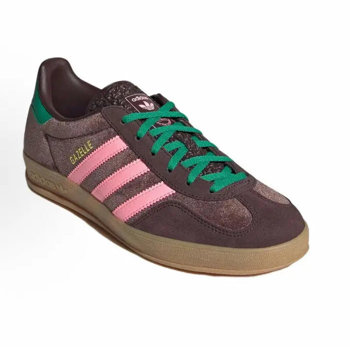 Dark brown Adidas sneaker with pink three stripes and green lace-up front