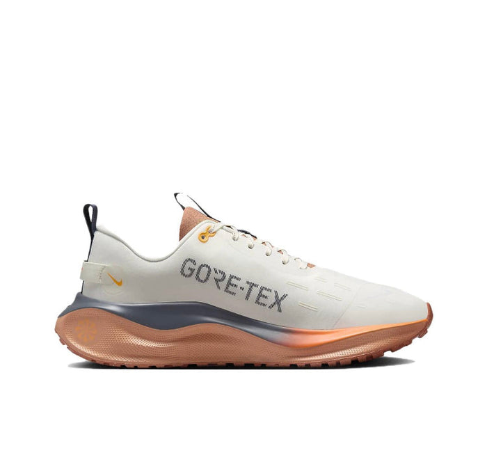 Nike Infinity RN 4 Gore-Tex shoe, cream upper with Gore-Tex logo and orange sole
