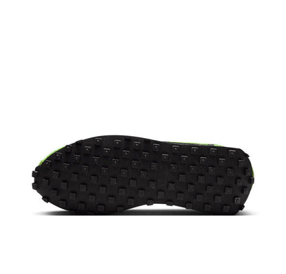 Green knit running sneakers with textured black outsole tread