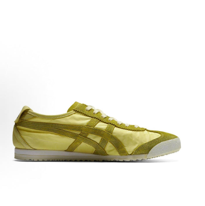Low-top sneakers in light chartreuse with side stripe panels and lace-up front