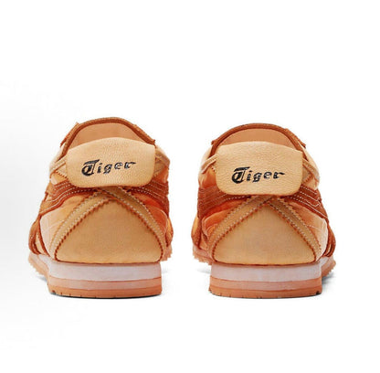 Low-top sneaker in orange-brown suede, cream heel tab with Tiger logo