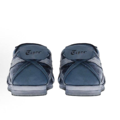 Mexico 66 NM sneakers heel view, dark blue leather with logo tabs and low profile sole