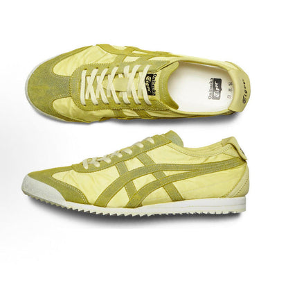 Light chartreuse low-top sneaker profile with lace-up front and toe cap stripe details