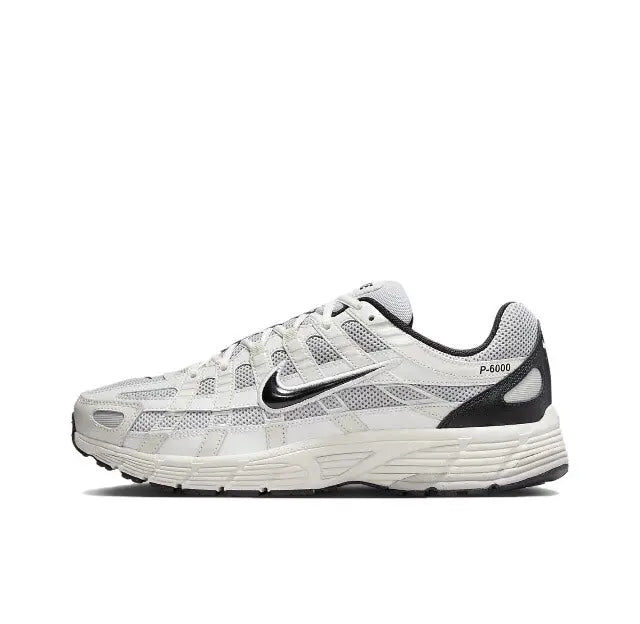 White running sneaker with black Swoosh and "P-6000" logo on side