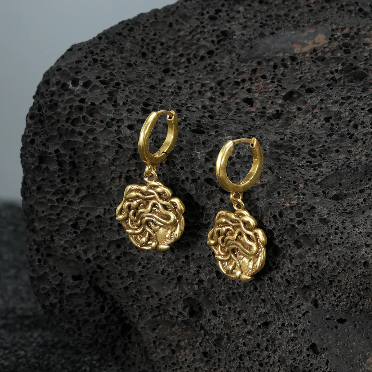 PETRIFYING GAZE DANGLE EARRINGS
