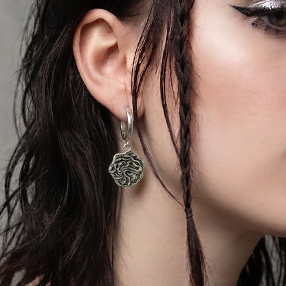 PETRIFYING GAZE DANGLE EARRINGS