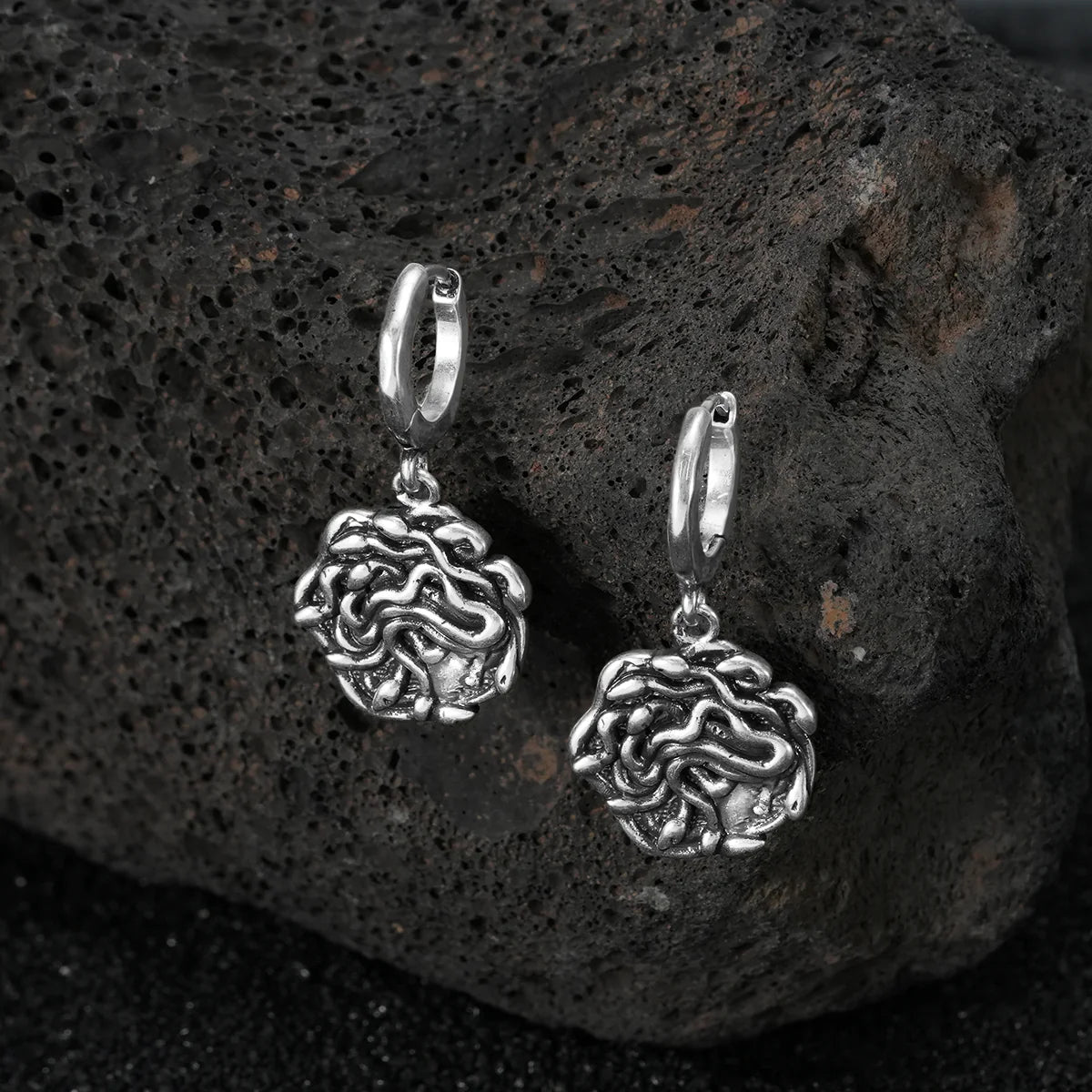 PETRIFYING GAZE DANGLE EARRINGS