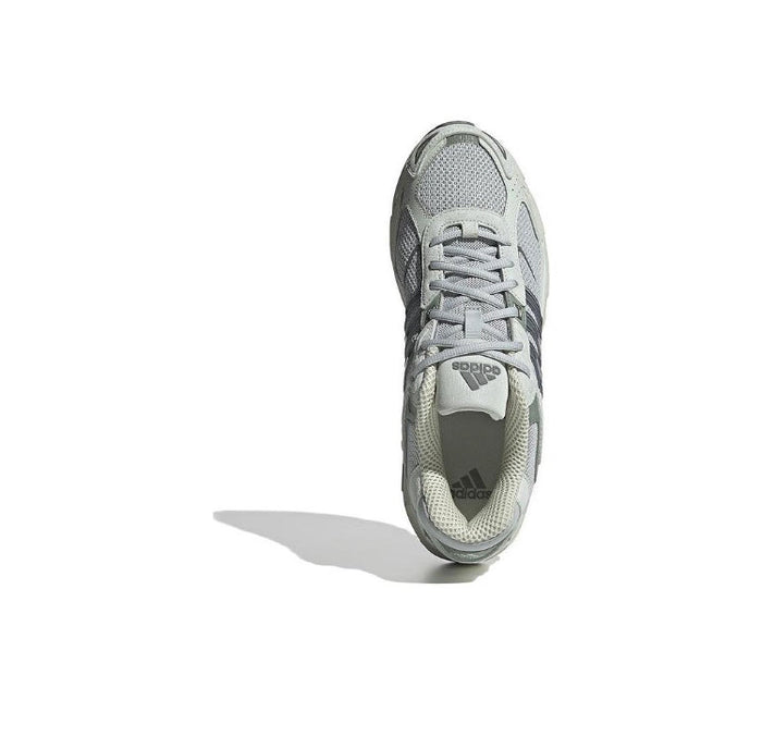 Adidas sneaker, gray laced upper with padded collar and side branding tag.