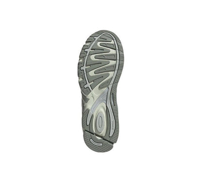 Adidas sneaker outsole, gray tread pattern with circular logo detail.