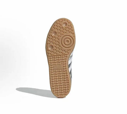 Adidas Samba OG outsole view with tan rubber tread and gum edge