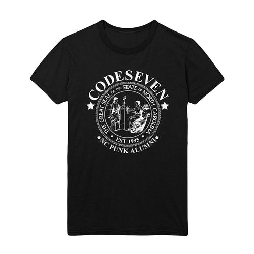 Black T-shirt with a white design. The word "CODESEVEN" is surrounded by stars around the seal of the state of North Carolina. Within the seal it states 'THE GREAT SEAL OF THE STATE OF NORTH CAROLINA" and "EST. 1995." Below the seal are the words "NC PUNK ALUMNI" surrounded in stars.