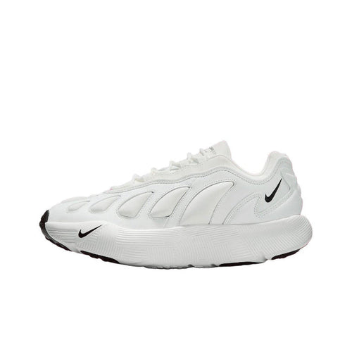 White low-top sneakers with Nike swoosh and black accents