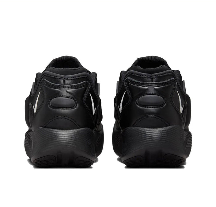 Black Nike sneakers heel view with cushioned collar and rear logo