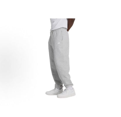 Grey fleece jogger pants, side view with small logo on thigh