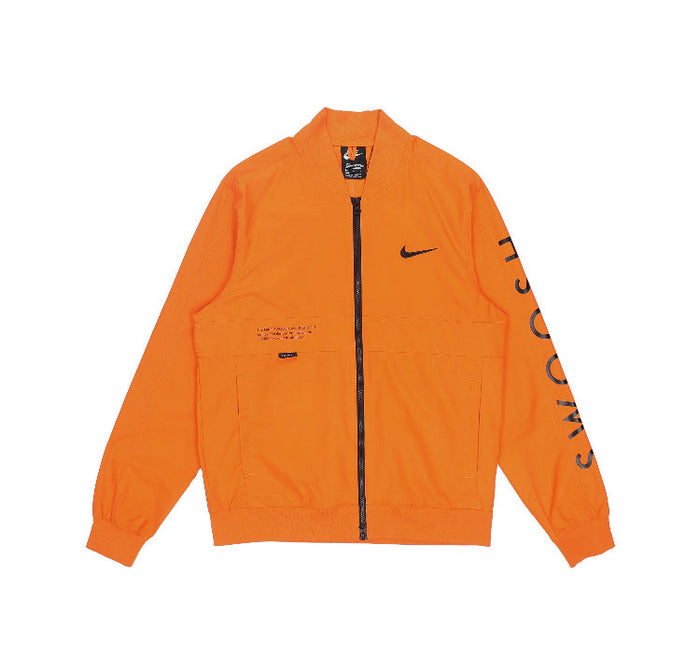 Orange Nike windbreaker jacket with full zip and black Swoosh on chest
