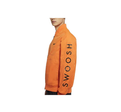 Orange Nike windbreaker jacket with vertical 'HOUSE' sleeve graphic and Swoosh