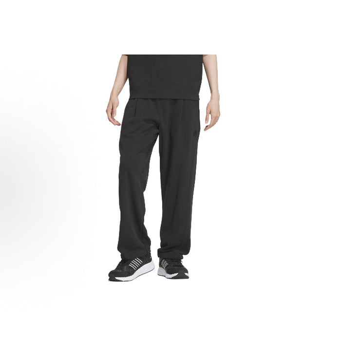 Black track pants with elastic waistband and tapered fit