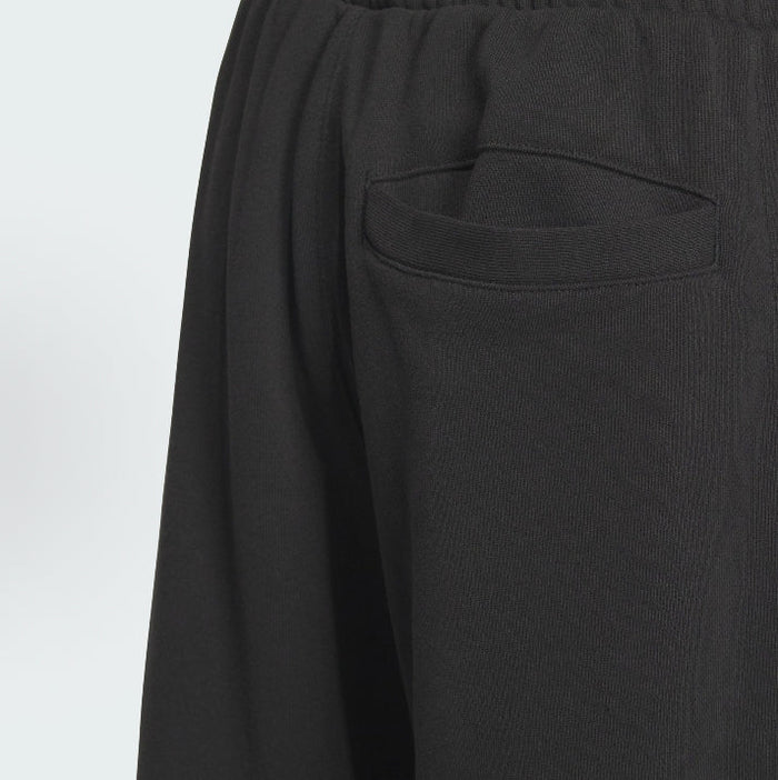 Black track pants with welt pocket and elastic waistband