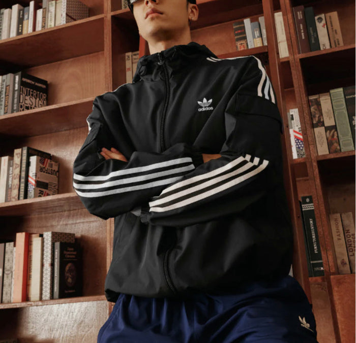Adidas track jacket, black with white triple-stripe sleeve panels and zip