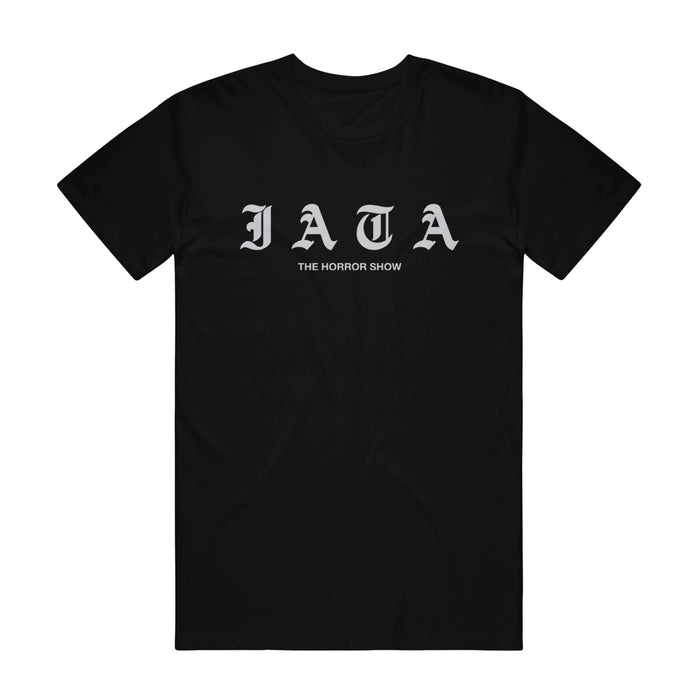 Black Comfort Colors t-shirt by I Am The Avalanche with large gothic gray "JATA" and smaller "THE HORROR SHOW" text printed on the front center.