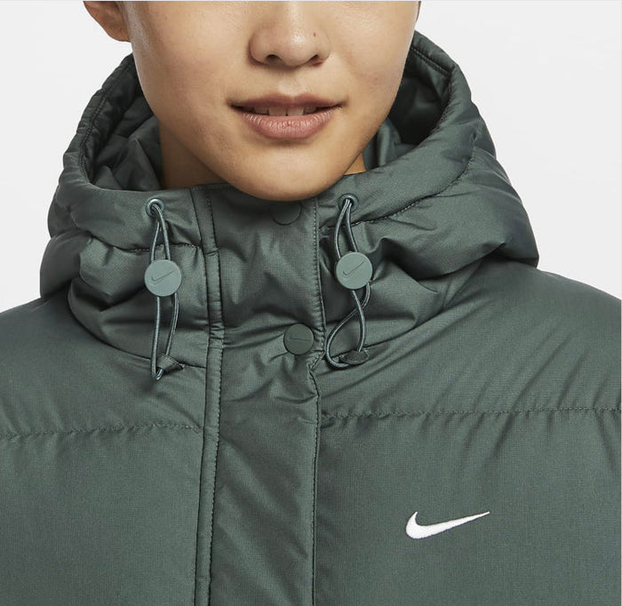 Nike Therma-FIT puffer jacket hood close-up, drawstring toggles, dark green