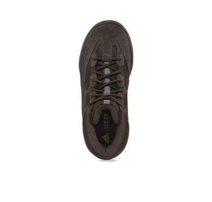 Dark brown lace-up boot viewed from toe, with padded collar and dark lining